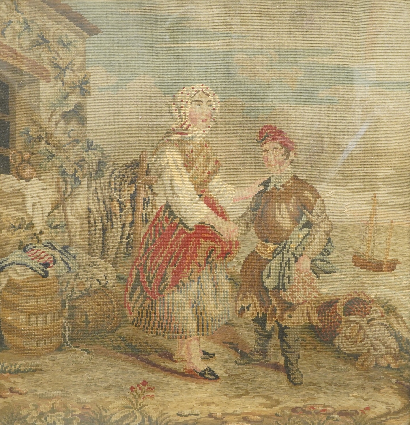 A Victorian woolwork panel, figures before a coastline, framed, 64 x 61cm